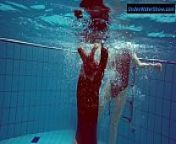 Two hot teens underwater from nudist pool dar
