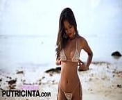 Asian Babe Putri Cinta fingering her bum hole at the beach from putri cinta anal
