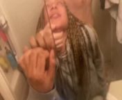Blasian bent over bathroom sink while roommates in other room from 13 sink
