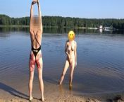 Sexy girl undresses and swims naked in public beach from nudity nudist
